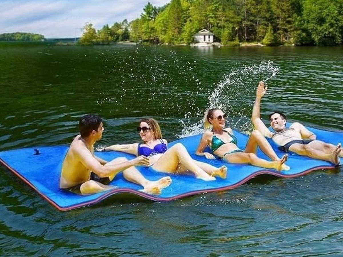 a person lying in a body of water