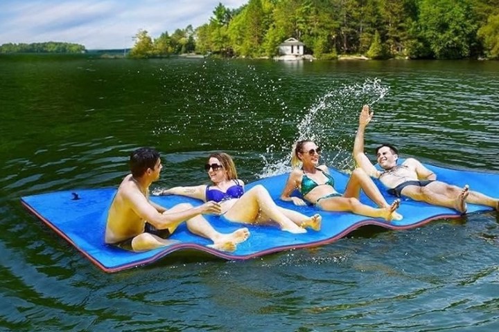 a person lying in a body of water