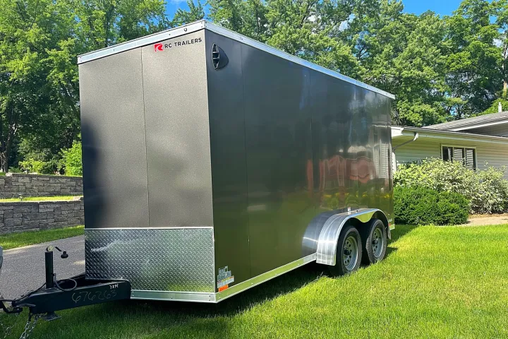 a truck is parked in the grass
