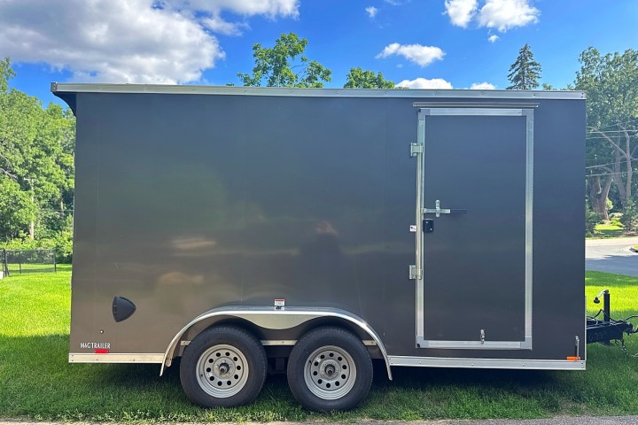 a truck is parked in the grass