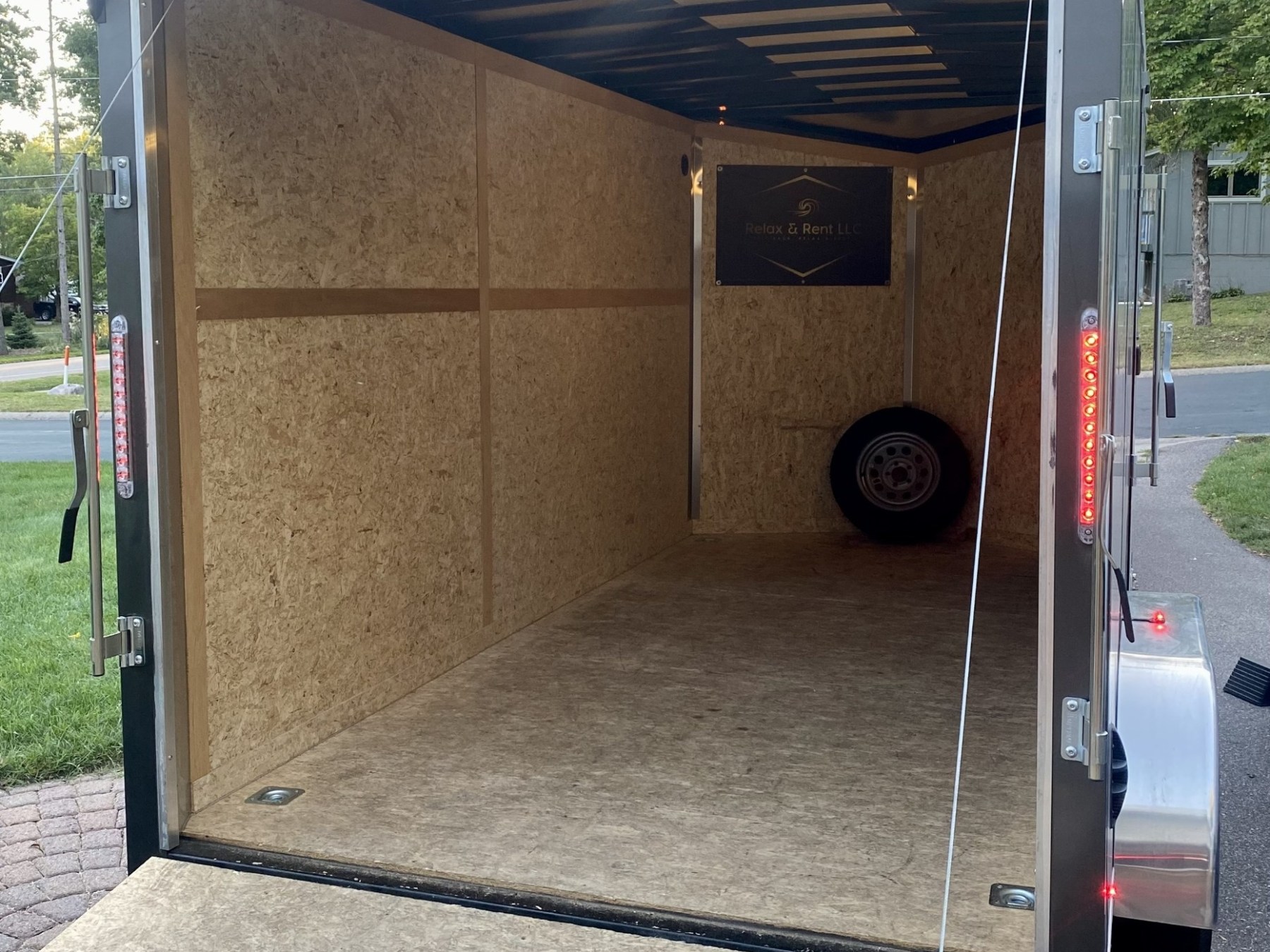 a close up of a small house in a parking lot